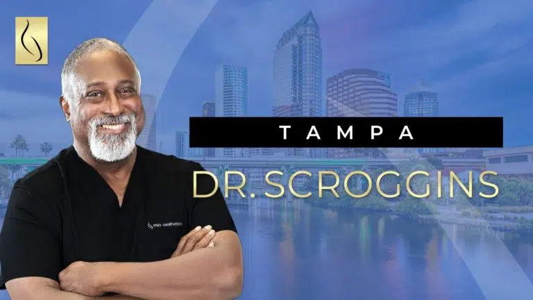 A YouTube video cover showing Carlton Scroggins, MD, a plastic surgeon.